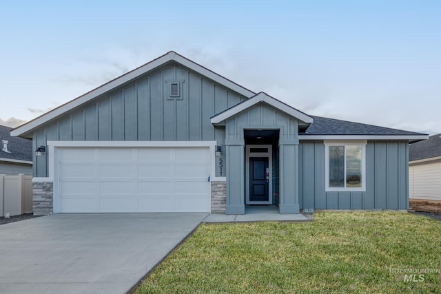 view of front of home with a garage, a shingled roof, driveway, board and batten siding, and a front yard