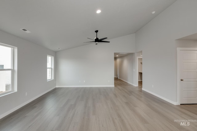 empty room with light wood-style flooring, recessed lighting, visible vents, a ceiling fan, and baseboards