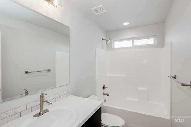 bathroom with recessed lighting, bathtub / shower combination, visible vents, toilet, and vanity