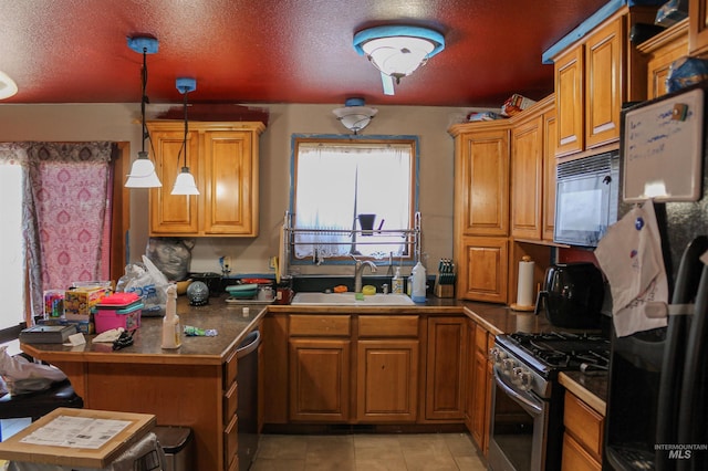 1396 W Crest Wood Dr, Meridian, ID 83642 - kitchen featuring stainless steel appliances, a peninsula, brown cabinetry, a textured ceiling, and light tile patterned floors