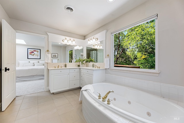 2383 E Lenox Ct, Eagle, ID 83616 - full bathroom with ensuite bathroom, double vanity, a jetted tub, and tile patterned floors