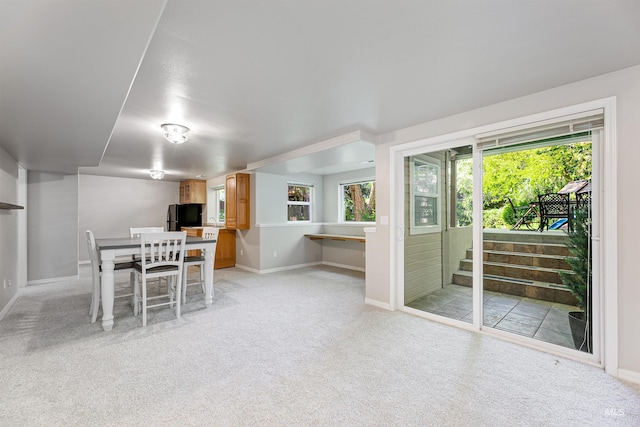 2383 E Lenox Ct, Eagle, ID 83616 - dining room with light colored carpet and baseboards
