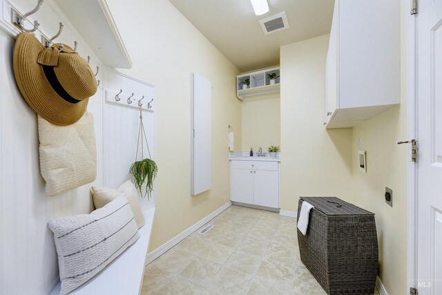 2383 E Lenox Ct, Eagle, ID 83616 - mudroom featuring a sink and baseboards