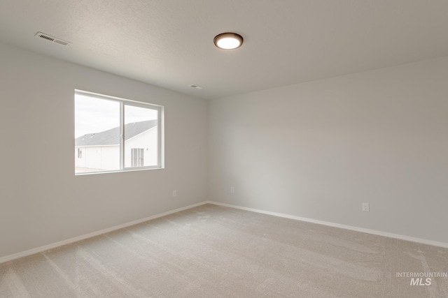 5315 E Burnte Peak St, Nampa, ID 83687 - empty room with light colored carpet and baseboards