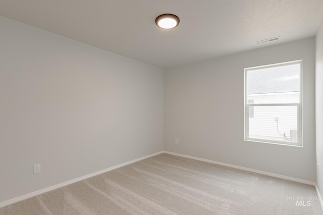 5315 E Burnte Peak St, Nampa, ID 83687 - unfurnished room with light colored carpet and baseboards