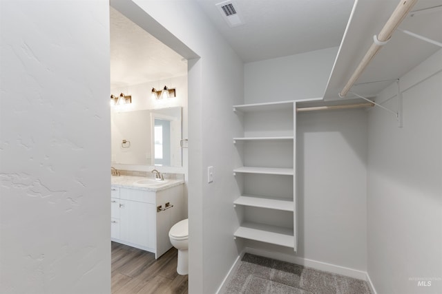 5315 E Burnte Peak St, Nampa, ID 83687 - bathroom featuring vanity, toilet, and baseboards