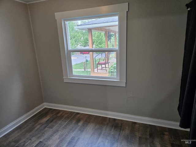 628 Main St, Orofino, ID 83544 - empty room featuring baseboards and dark wood-style floors