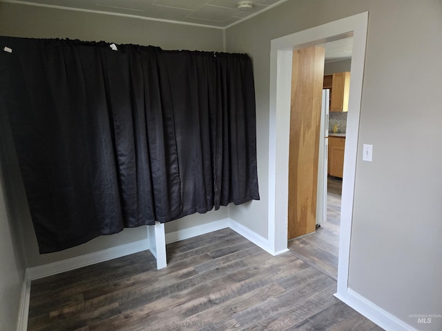 628 Main St, Orofino, ID 83544 - spare room with wood finished floors and baseboards