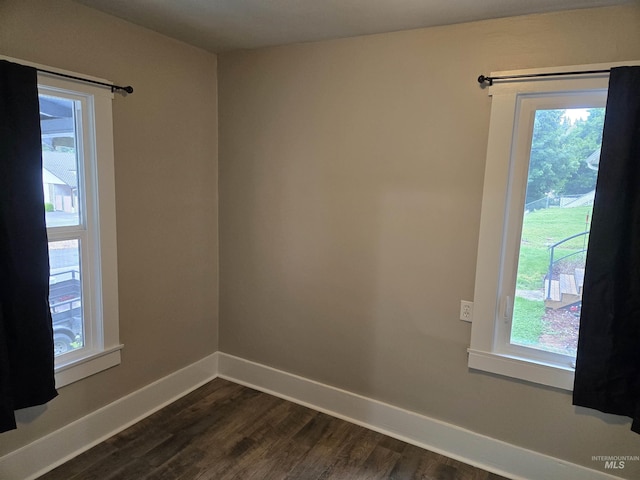 628 Main St, Orofino, ID 83544 - unfurnished room featuring plenty of natural light and dark wood finished floors
