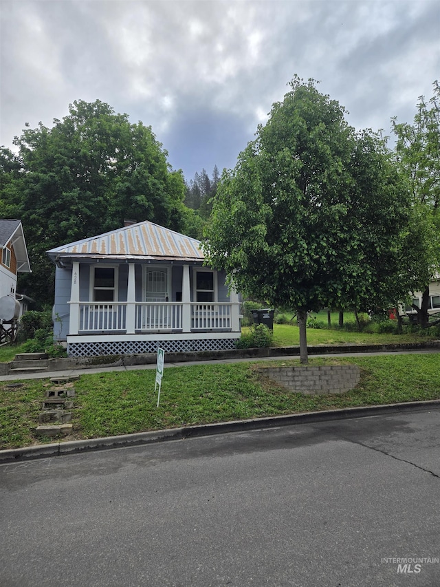 628 Main St, Orofino, ID 83544 - view of front of property featuring a porch