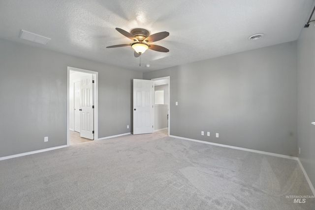 841 Shire St, Middleton, ID 83644 - unfurnished bedroom featuring baseboards, light carpet, a textured ceiling, and a ceiling fan