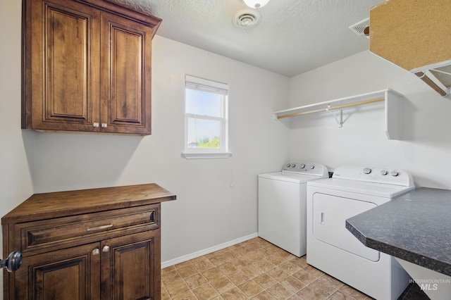 841 Shire St, Middleton, ID 83644 - washroom featuring washing machine and dryer, baseboards, cabinet space, and a textured ceiling