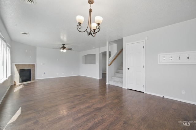 841 Shire St, Middleton, ID 83644 - unfurnished living room with ceiling fan, stairway, baseboards, and a fireplace