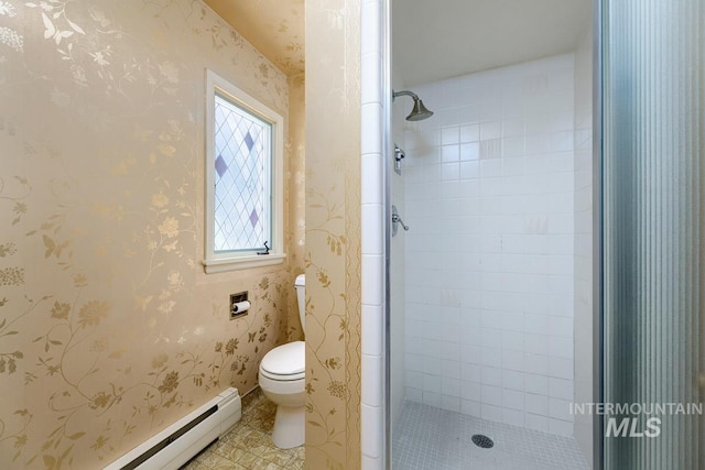 928 N Argyll Dr, Boise, ID 83702 - bathroom with baseboard heating, a stall shower, toilet, wallpapered walls, and tile patterned floors
