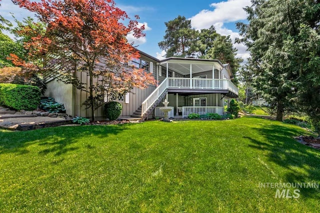 928 N Argyll Dr, Boise, ID 83702 - back of house featuring stairs and a yard
