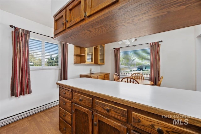 371 Dubois, Twin Falls, ID 83301 - kitchen with plenty of natural light, open shelves, wood finished floors, and light countertops