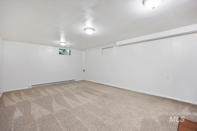 371 Dubois, Twin Falls, ID 83301 - finished below grade area with carpet floors, a baseboard radiator, and baseboards