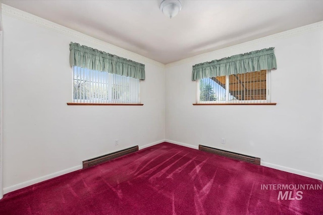 371 Dubois, Twin Falls, ID 83301 - spare room with a baseboard radiator, a baseboard heating unit, carpet flooring, and a wealth of natural light