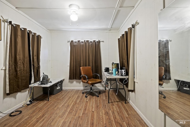 living area with hardwood / wood-style floors