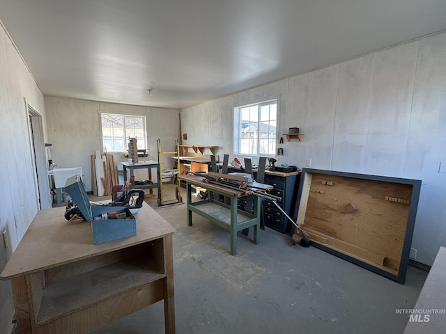 office space featuring concrete floors