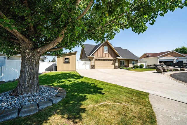 201 E S 10th St, Grangeville, ID 83530 - view of front of house featuring board and batten siding and concrete driveway
