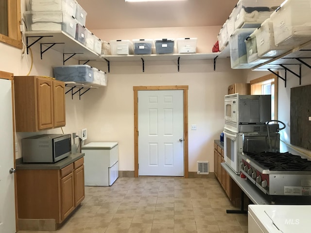 kitchen featuring fridge