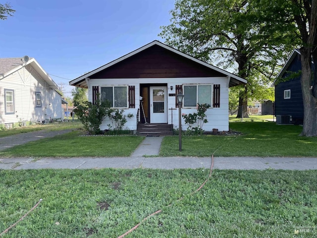 410 3rd Ave E, Jerome, ID 83338 - bungalow with a front lawn and central AC unit