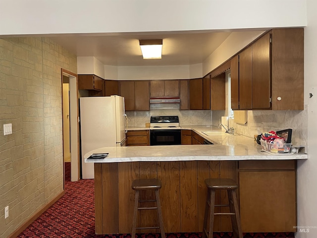 410 3rd Ave E, Jerome, ID 83338 - kitchen featuring electric stove, a sink, light countertops, and freestanding refrigerator