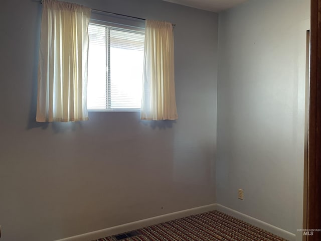 410 3rd Ave E, Jerome, ID 83338 - carpeted empty room featuring baseboards