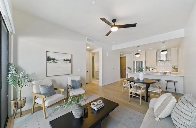 4340 E Haystack St Unit 205, Boise, ID 83716 - living room featuring light wood finished floors, ceiling fan, and recessed lighting