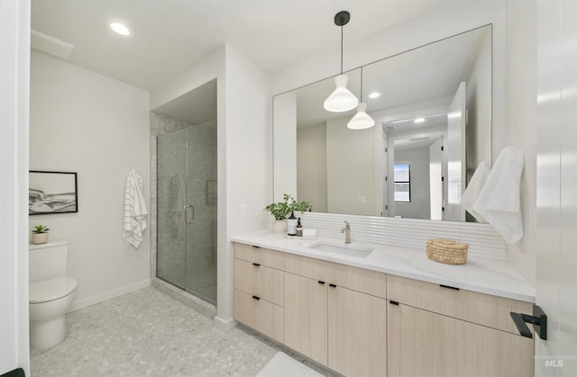 4340 E Haystack St Unit 205, Boise, ID 83716 - bathroom featuring vanity, a shower stall, and recessed lighting