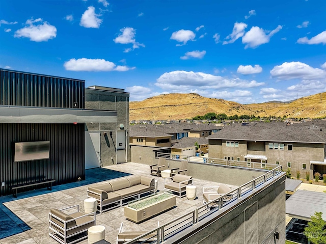 4340 E Haystack St Unit 205, Boise, ID 83716 - view of patio / terrace with a mountain view, a residential view, outdoor lounge area, and area for grilling