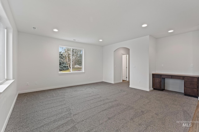 view of carpeted spare room