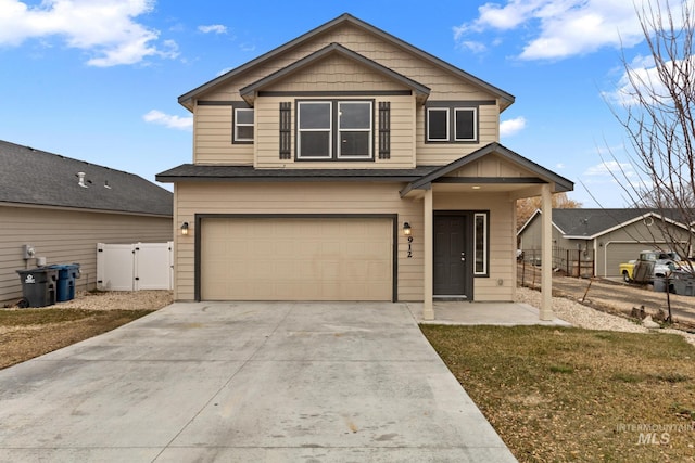 view of front facade featuring a front yard and a garage