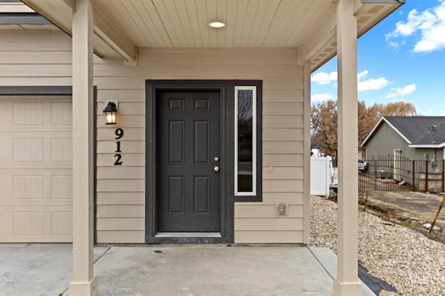 property entrance featuring a garage