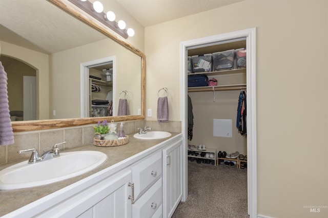 2493 S Skyview Dr, Nampa, ID 83686 - bathroom with double vanity and a spacious closet