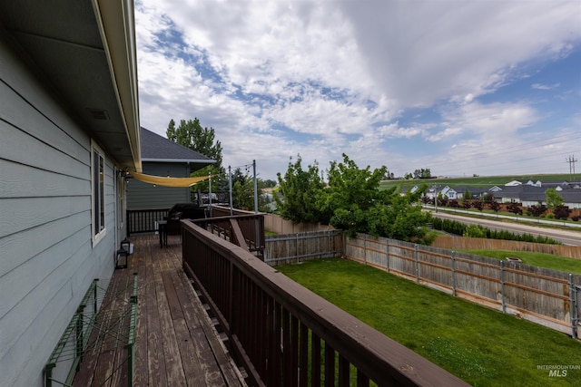 2493 S Skyview Dr, Nampa, ID 83686 - wooden deck with a fenced backyard