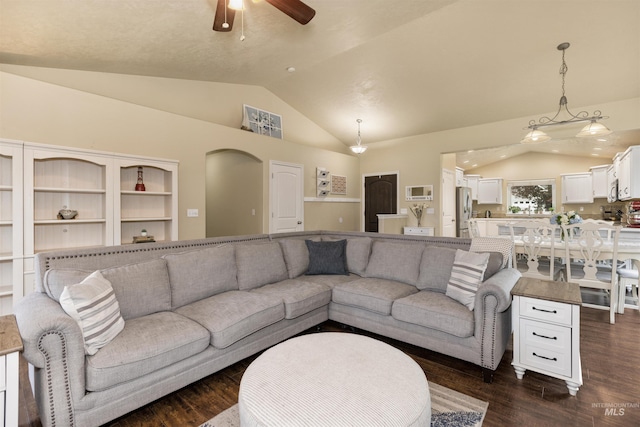 2493 S Skyview Dr, Nampa, ID 83686 - living room with a ceiling fan, dark wood-type flooring, and high vaulted ceiling