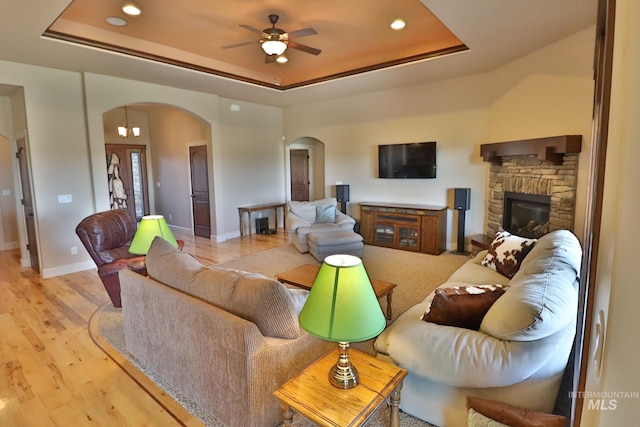 924 Main St S, Kimberly, ID 83341 - living room with arched walkways, a tray ceiling, ceiling fan, wood finished floors, and recessed lighting