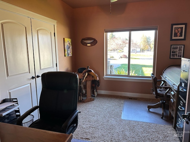 office area featuring ceiling fan and carpet