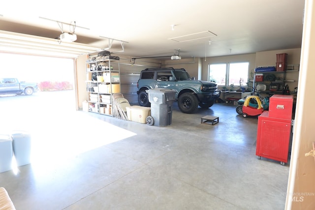 garage featuring a garage door opener