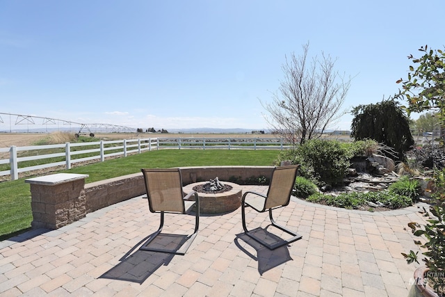 924 Main St S, Kimberly, ID 83341 - view of patio with a fire pit and a view of countryside