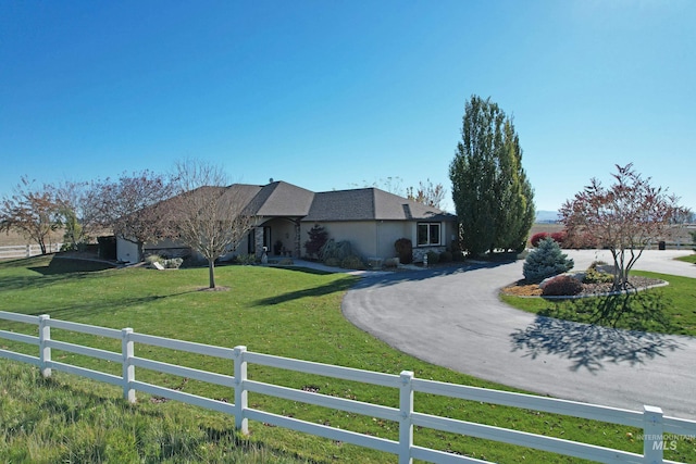 exterior space featuring a front yard