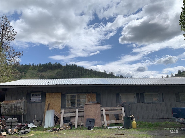 120 Three Bear Ln, Stites, ID 83552 - rear view of property with metal roof and board and batten siding