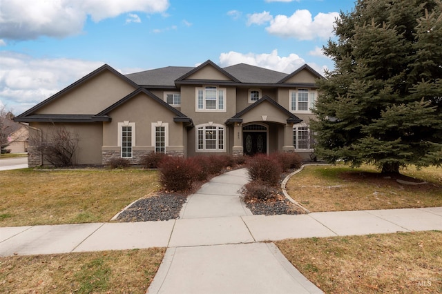 view of front facade featuring a front yard