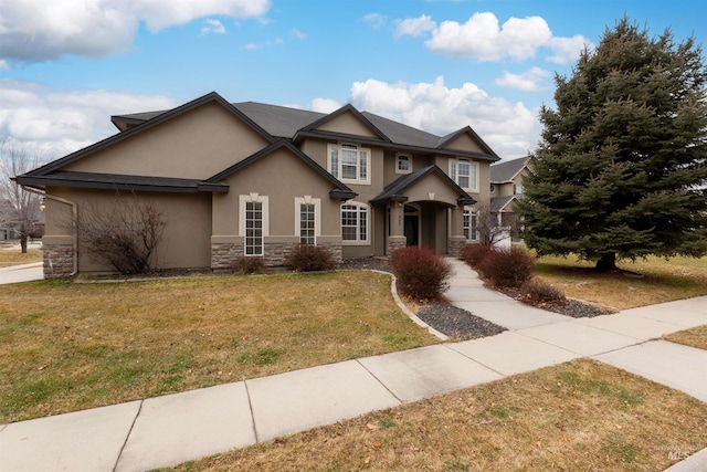 view of front of home featuring a front lawn