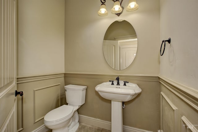 bathroom featuring toilet