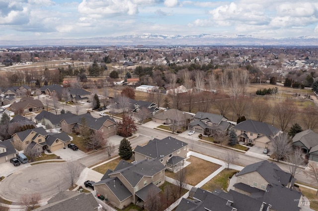 drone / aerial view featuring a mountain view