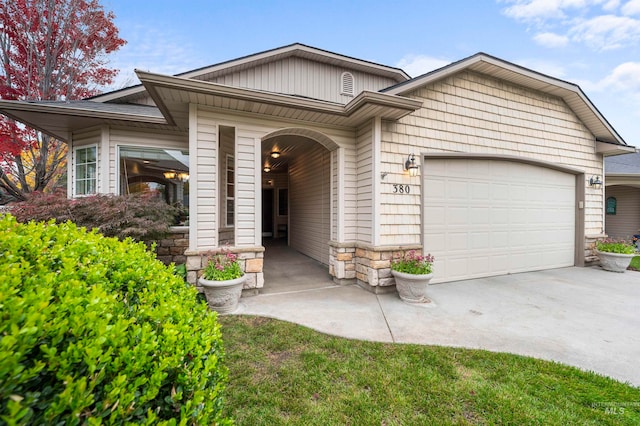 view of front of property with a garage