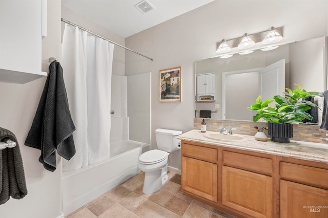 full bathroom with tile patterned floors, decorative backsplash, toilet, shower / bath combo with shower curtain, and vanity